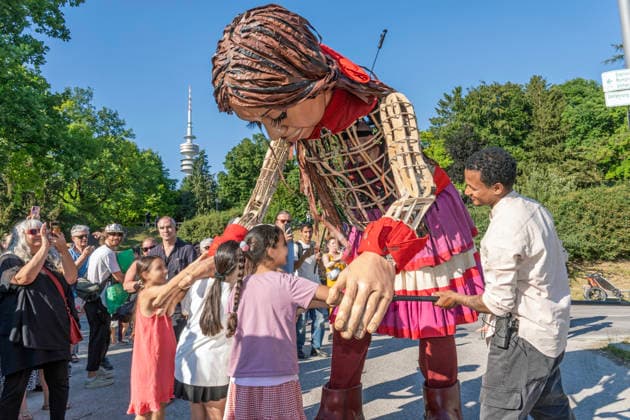 Munich, the giant puppet Little Amal at the Tollwood Festival