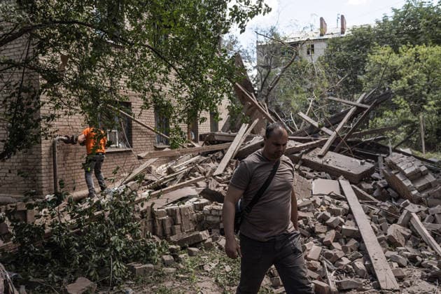 War in Ukraine, Sloviansk, clean-up operations following a Russian rocket launcher attack