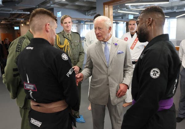 King Charles III visits the Roger Gracie Jiu-Jitsu Academy for the REORG charity in London