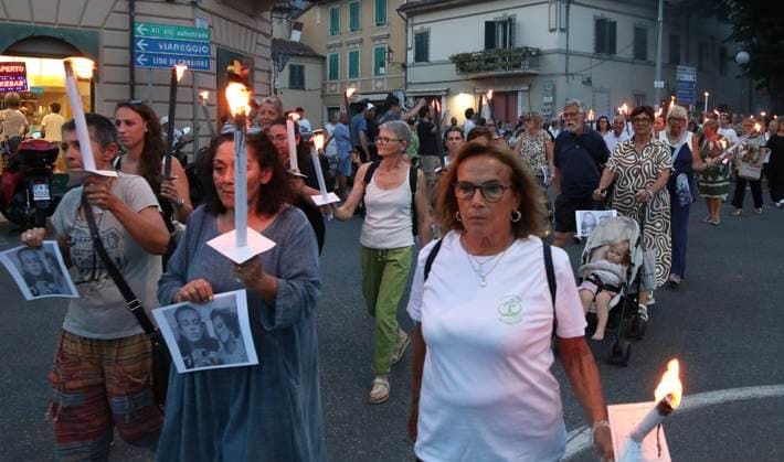 Italy: Torchlight procession in memory of the victims of a double murder in Camaiore