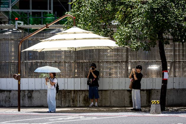 Taiwan, a manual parasol on a street in Kaohsiung City