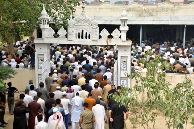 Pakistan, Lahore: Mourning following a roof collapse at a tuition centre that left 14 children dead