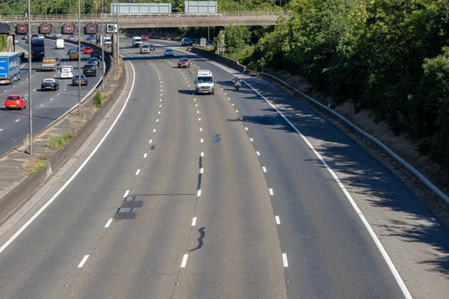 UK: Light traffic on the M25 near Leatherhead, Surrey, following England’s World Cup match