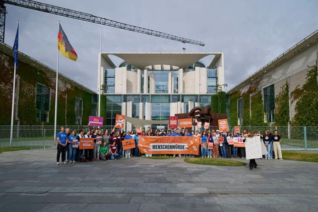 Berlin: Protest against cuts to development aid outside the Federal Chancellery