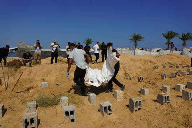 Middle East conflict, Gaza, investigation into mass graves in Deir al-Balah