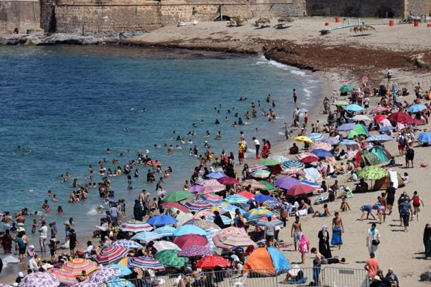 Algeria, people on the beach in Algiers