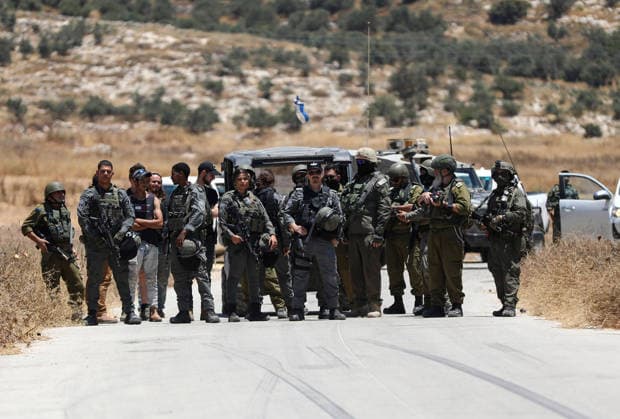 Middle East conflict, West Bank, Israeli soldiers block Palestinians’ access to their land near Hebron