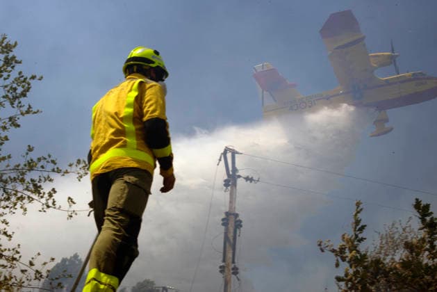 Spain, forest fire near Untes, Galicia