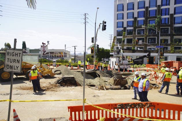 USA, repairs following a burst water pipe in West Hollywood