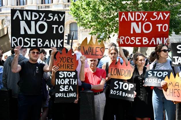 UK: Fossil Free protest against the Rosebank oil field outside Parliament in London