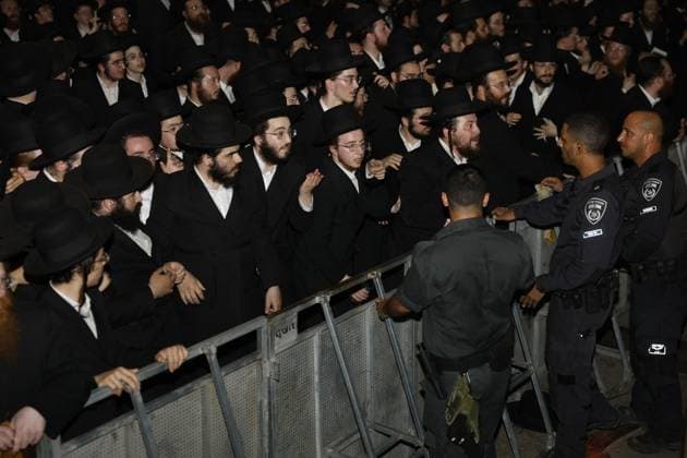 Israel: Ultra-Orthodox Jews protest against the arrest of a conscientious objector outside the military prison in Cfar Yona