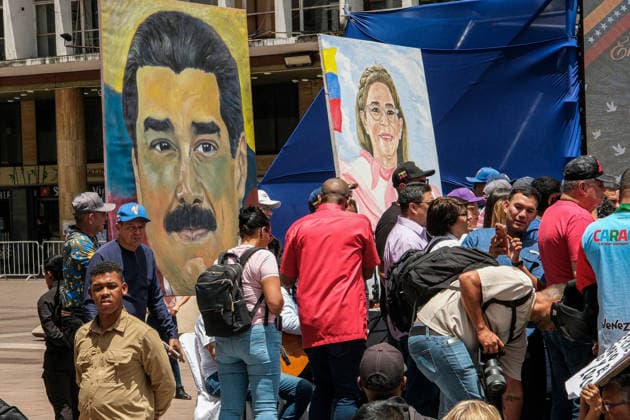Venezuela: Supporter of Nicolás Maduro Guerra speaks at a rally in Plaza Caracas