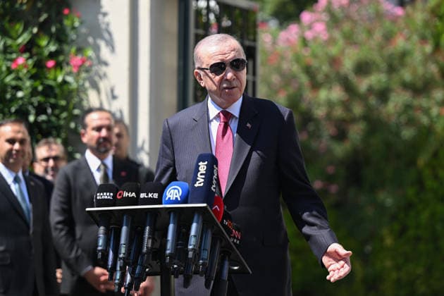 Turkey: Recep Tayyip Erdogan answers questions from the press after Friday prayers in Istanbul