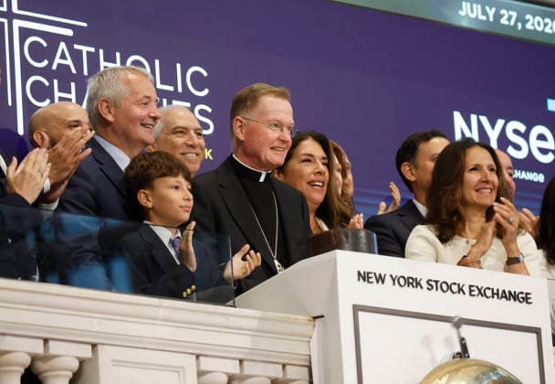USA: Representatives from Catholic Charities ring the opening bell at the New York Stock Exchange on Wall Street
