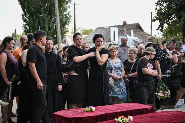 War in Ukraine, memorial service in Radushne