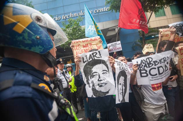 Philippines: Protest march by youth and grassroots groups in Bonifacio Global City against Pax Silica
