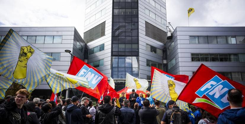 Netherlands: Cleaners protest outside Nazi headquarters during a 48-hour strike