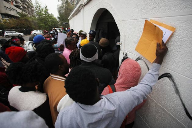 Chile: Queues outside the Haitian Embassy in Santiago