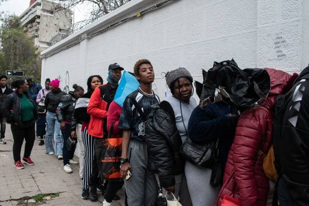 Chile: Queues outside the Haitian Embassy in Santiago
