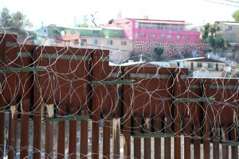 Arizona, border fence between USA and Mexico in Nogales