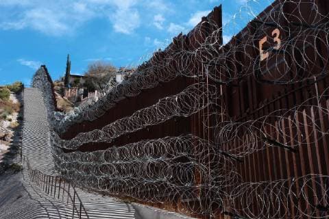 USA, border fence between Arizona and Mexico in Nogales