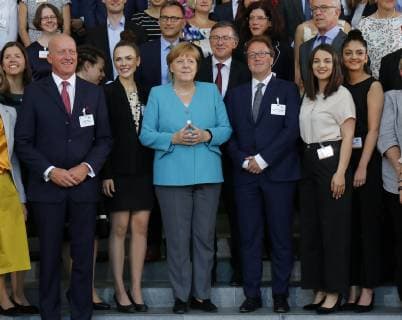 Berlin, Merkel honours startsocial award winner for outstanding social commitment