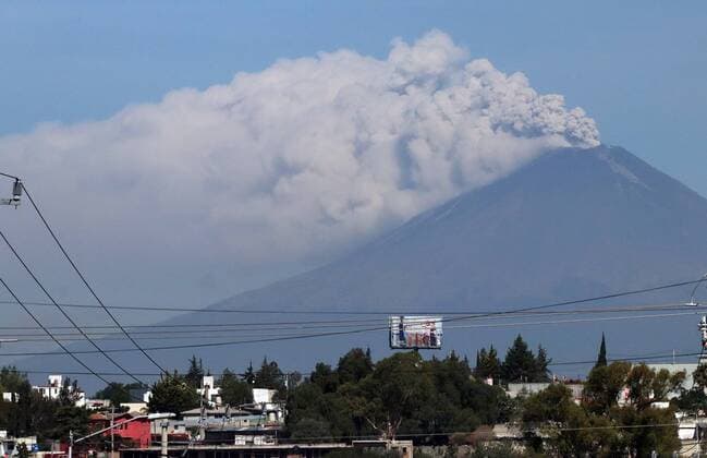 Mexico, ash clouds above the volcano Popocatepetl