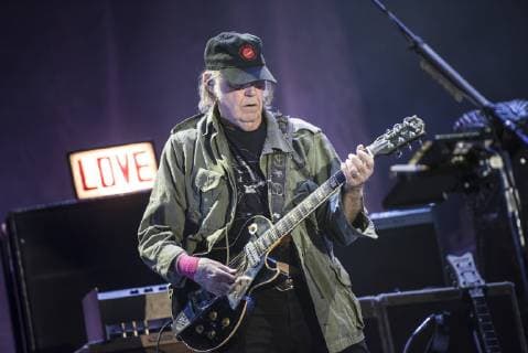 Neil Youngs music is back on Spotify after boycott, archive images
