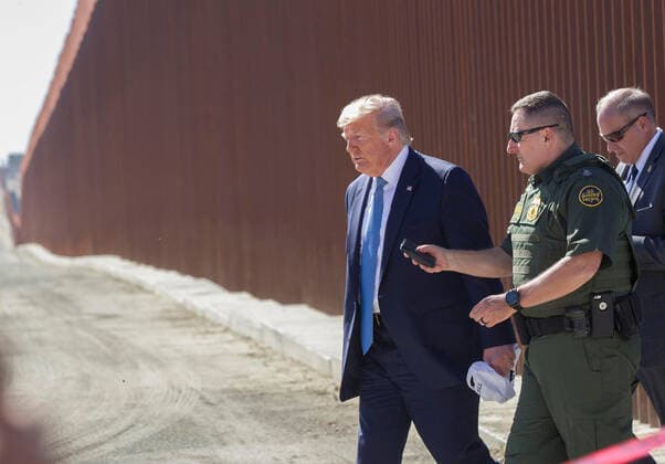 USA, President Trump visits wall at the border to Mexico in San Diego