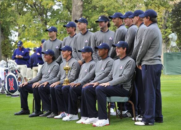 United States Ryder Cup team members Zach Johnson (L-R) Webb Simpson, Jim Furyk, Bubba Watson, Dustin Johnson, Brandt Snedeker, Steve Stricker, Jason Dufner (back row L-R), Phil Mickelson, Matt Kuchar, team captain Davis Love III, Tiger Woods and Keegan Bradley pose for a team photo at the 39th Ryder Cup at Medinah Country Club on Tuesday, September 25, 2012 in Medinah, Illinois. Ryder Cup tournament play begins Friday. BKX2012092534