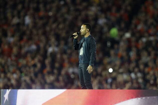 Jan. 6, 2014 - Pasadena, California, United States of America - Jonh Legend performs the National Anthem prior to the start of the BCS Championship Game in Pasadena, California. Between the 1 ranked Florida State Seminoles and the 2 ranked Auburn Tigers. The final game of the Bowl Championship Series, before moving to a four team playoff system. NCAA College League USA Football 2014 - Jan 6 - BCS Championship Game - Florida St vs Auburn - ZUMAl30