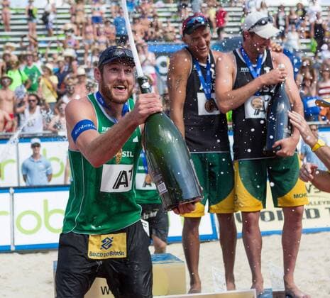 03.08.2014, Strandbad, Klagenfurt, AUT, A1 Beachvolleyball Grand Slam 2014, Finalspiel, im Bild Gewinner Bruno Oscar Schmidt (BRA) im Hintergrund Christopher McHugh (AUS), Isaac Kapa (AUS) during the A1 Beachvolleyball Grand Slam at the Strandbad Klagenfurt, Austria on 2014 08 03. 2014, , EP_stei EX