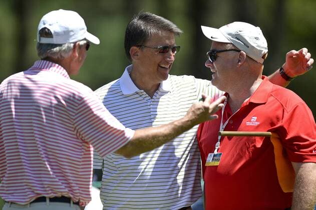 May 13, 2015 - Charlotte, NC, USA - Mac Everett, left, North Carolina Gov. Pat McCrory, center, and Jim Taylor, a marshall at the sixth tee box, joke around during the Pro-Am on Wednesday, May 13, 2015, at Quail Hollow Club in Charlotte, N.C. Wells Fargo Pro-Am round - ZUMAm67_
