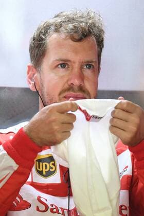 Sebastian VETTEL,GER (Scuderia Ferrari) in der Box mit Feuerhaube, Aktion,Einzelbild, angeschnittenes Einzelmotiv,Portraet,Portrait,Porträt. 1.Training,Formel 1:GP von Deutschland,Hockenheimring,Saison2016,am 28.07.2016.