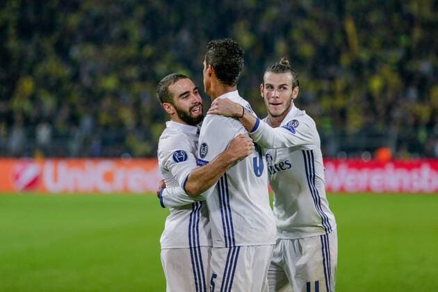GER, Champions League, Borussia Dortmund vs Real Madrid 27.09.2016, Signal Iduna Park, Dortmund, GER, Champions League, Borussia Dortmund vs Real Madrid, im Bild picture shows VARANE (Real Madrid 5) bejubelt sein Tor zum 1:2 celebrates after scoring 1:2 with BALE (Real Madrid 11), CARVAJAL (Real Madrid 2), Foto@ nordphoto Rauch nordphotox xrauch
