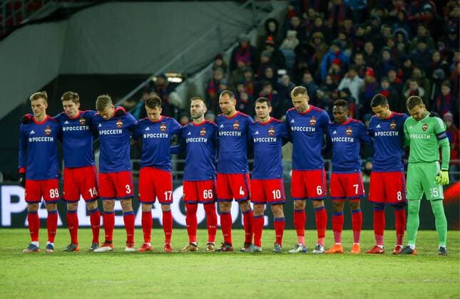 MOSCOW, RUSSIA – MARCH 8, 2018: CSKA Moscow s Konstantin Kuchayev, Kirill Nababkin, Pontus Wernbloom, Alexander Golovin, Bibras Natkho, Sergei Ignashevich, Alan Dzagoev, Alexei Berezutsky, Ahmed Musa, Georgi Milanov, and goalkeeper Igor Akinfeev (L-R) hold a minute s silence in memory of the late Italian footballer Davide Astori ahead of the first leg of their 2017 18 UEFA Europa League Round of 16 football match at VEB Arena Stadium. Lyon won the game 1-0. Mikhail Tereshchenko TASS TS077138
