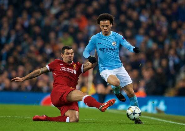 (180411) -- MANCHESTER, April 11, 2018 () -- Liverpool s Dejan Lovren (L) vies with Manchester City s Leroy Sane during the UEFA Champions League quarterfinal second leg soccer match between Manchester City and Liverpool in Manchester, Britain, on April 10, 2018. Liverpool won 5-1 on aggregate and advanced to the semifinal. () FOR EDITORIAL USE ONLY. NOT FOR SALE FOR MARKETING OR ADVERTISING CAMPAIGNS. NO USE WITH UNAUTHORIZED AUDIO, VIDEO, DATA, FIXTURE LISTS, CLUB LEAGUE LOGOS OR LIVE SERVICES. ONLINE IN-MATCH USE LIMITED TO 45 IMAGES, NO VIDEO EMULATION. NO USE IN BETTING, GAMES OR SINGLE CLUB LEAGUE PLAYER PUBLICATIONS.) (SP)BRITAIN-MANCHESTER-SOCCER-UEFA CHAMPIONS LEAGUE-MANCHESTER CITY VS LIVERPOOL Xinhua