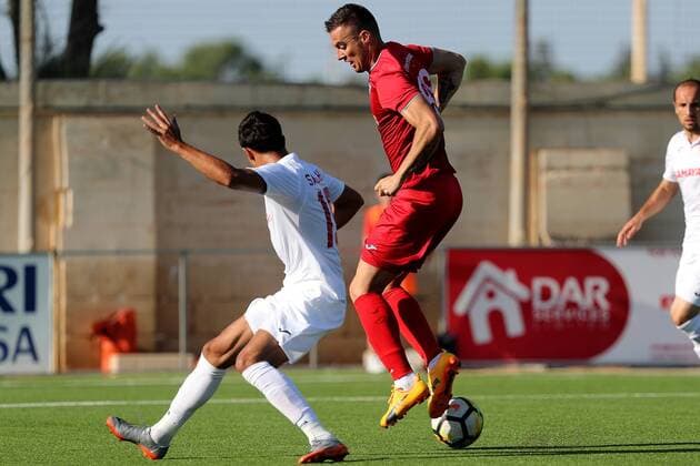 Fußball, EL Qualifikation, Balzan FC - FK Keshla 12 07 2018 - Centenary Stadium, Ta Qali, Malta UEFA Europa League 2018 2019 First Qualifying Round, First Leg Balzan FC striker Bojan Kaljevic (R) and Azer Salahli (L) of Kesla FK during the UEFA Europa League, First Qualifying Round, first leg match between Balzan FC of Malta and Kesla FK from Azerbaijan at the Centenary Stadium, Ta Qali, Malta on 12 July, 2018. Balzan FC won the first leg 4-1. Balzan FC v Kesla FK - UEFA Europa League 2018 19 UEL_18_19