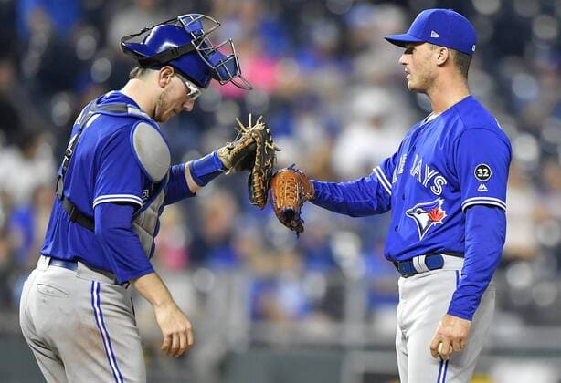 August 14, 2018 - Kansas City, MO, USA - Toronto Blue Jays relief pitcher Thomas Pannone gets a high -five from catcher Danny Jansen, left, before being relieved in the seventh inning against the Kansas City Royals on Tuesday, Aug. 14, 2018, at Kauffman Stadium in Kansas City, Mo. The Blue Jays won, 6-5. Toronto at Kansas City - ZUMAm67_ 20180814_zaf_m67_065 Copyright: xJohnxSleezerx