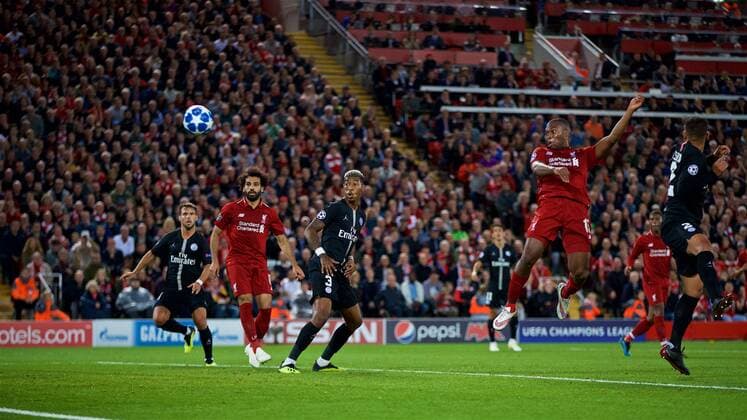 (180919) -- LIVERPOOL, Sept. 19, 2018 -- Liverpool s Daniel Sturridge (2nd R) scores a goal during the UEFA Champions League Group C match between Liverpool and Paris Saint-Germain at Anfield Stadium in Liverpool, Britain on Sept. 18, 2018. Liverpool won 3-2. FOR EDITORIAL USE ONLY. NOT FOR SALE FOR MARKETING OR ADVERTISING CAMPAIGNS. NO USE WITH UNAUTHORIZED AUDIO, VIDEO, DATA, FIXTURE LISTS, CLUB LEAGUE LOGOS OR LIVE SERVICES. ONLINE IN-MATCH USE LIMITED TO 45 IMAGES, NO VIDEO EMULATION. NO USE IN BETTING, GAMES OR SINGLE CLUB LEAGUE PLAYER PUBLICATIONS. (SP)BRITAIN-LIVERPOOL-FOOTBALL-UEFA CHAMPIONS LEAGUE-LIVERPOOL VS PSG HanxYan