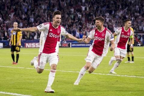 AMSTERDAM, AFC Ajax - AEK Athens FC, football, Champions League, season 2018-2019, 19-09-2018, Stadium Johan Cruijff Arena, Ajax player Nico Tagliafico (2L) has scored 1-0, Ajax player Klaas Jan Huntelaar (M), disappointed AEK Athens player Niklas Hult (L), Ajax player Dusan Tadic (R) Ajax - AEK Athens x2476728x