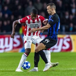 EINDHOVEN, Netherlands, 03-10-2018, football, Philips stadium, Champions league, season 2018 2019, PSV player Denzel Dumfries (L), Inter Milan player Ivan Perisic (R), during the match PSV - Inter Milan, PSV - Inter Milan x2517850x