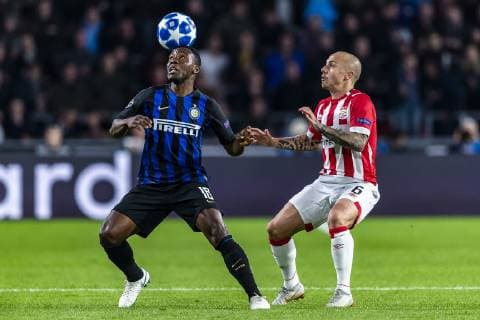 EINDHOVEN, Netherlands, 03-10-2018, football, Philips stadium, Champions league, season 2018 2019, Inter Milan player Kwadwo Asamoah (L), PSV player Angelino (R), during the match PSV - Inter Milan, PSV - Inter Milan x2517852x