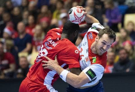 Sport Bilder des Tages Handball WM, Tunesien - Norwegen DK: 20190111, Herning, Danmark: 2019 IHF Verdensmesterskabet i handbold i Tyskland Danmark i Jyske Bank Boxen, Herning: Tunesien-Norge. Mosbah Sanai (19), Tunisia, Christian O Sullivan (24), Norway Foto: Lars M¿ller UK: 20190112, Herning, Denmark: 2019 IHF Handball World Championship WM Weltmeisterschaft in Germany and Denmark. Jyske Bank Boxen, Herning. Tunisia-Norway. Mosbah Sanai (19), Tunisia, Christian O Sullivan (24), Norway