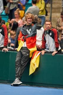 Celebration of the german team, Alexander (Sascha) ZVEREV, GER , Philipp KOHLSCHREIBER, GER Tennis Pro, with national banner, GERMANY - HUNGARY 3-0 Qualifiers Round Mens Tennis Davis Cup in Frankfurt, Germany, February 02, 2019 Season 2018 2019, Photographer: Peter Schatz