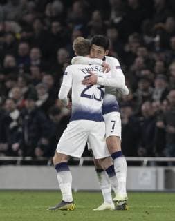 (190410) -- LONDON, April 10, 2019 (Xinhua) -- Tottenham Hotspur s Heung-Min Son (R) celebrates with Christian Eriksen after scoring during the UEFA Champions League Quater Final First Leg match between Tottenham Hotspur and Manchester City at The Tottenham Hotspur Stadium in London, Britain on April 9, 2019. Tottenham Hotspur won 1-0. (Xinhua Han Yan) FOR EDITORIAL USE ONLY. NOT FOR SALE FOR MARKETING OR ADVERTISING CAMPAIGNS. NO USE WITH UNAUTHORIZED AUDIO, VIDEO, DATA, FIXTURE LISTS, CLUB LEAGUE LOGOS OR LIVE SERVICES. ONLINE IN-MATCH USE LIMITED TO 45 IMAGES, NO VIDEO EMULATION. NO USE IN BETTING, GAMES OR SINGLE CLUB LEAGUE PLAYER PUBLICATIONS. (SP)BRITAIN-LONDON-FOOTBALL-CHAMPIONS LEAGUE-QUARTERFINAL-TOT HOTSPUR VS MAN CITY