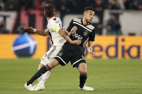 TORINO, Football,16-04-2019, Allianz Stadium . Champions League quarter finals second leg Juventus - Ajax. Juventus player Paulo Dybala (L) and Ajax player Noussair Mazraoui (R) during the game Juventus - Ajax (1-2). Juventus - Ajax x3202340x