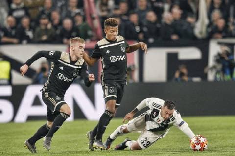 TORINO, Football,16-04-2019, Allianz Stadium . Champions League quarter finals second leg Juventus - Ajax. Ajax player Daley Sinkgraven (L) and Ajax player David Neres (C) and Juventus player Federico Bernardeschi (R) during the game Juventus - Ajax (1-2). Juventus - Ajax x3202355x