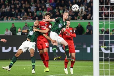 Goncalo Paciencia Eintracht Frankfurt vs. Marcel Tisserand li and Maximilian Arnold VfL Wolfsburg 1 Soccer Bundesliga 2018 2019 VfL Wolfsburg vs. Eintracht Frankfurt in the Volkswagen Arena in Wolfsburg Action Germany Soccer Man Men 22 04 2019 According to the specifications of the DFL Deutsche Fußball Liga is prohibited from using or having used photographs taken in the stadium and or from the match in the form of sequence images and or video-like photo sequences DFL regulations prohibit any use of photographs as image sequences and or quasi video