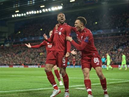 (190508) -- LIVERPOOL, May 8, 2019 (Xinhua) -- Liverpool s Georginio Wijnaldum (C) celebrates scoring during the UEFA Champions League Semi-Final second Leg match between Liverpool FC and FC Barcelona Barca at Anfield in Liverpool, Britain on May 7, 2019. Liverpool won 4-3 on aggregate and reached the final. (Xinhua) FOR EDITORIAL USE ONLY. NOT FOR SALE FOR MARKETING OR ADVERTISING CAMPAIGNS. NO USE WITH UNAUTHORIZED AUDIO, VIDEO, DATA, FIXTURE LISTS, CLUB LEAGUE LOGOS OR LIVE SERVICES. ONLINE IN-MATCH USE LIMITED TO 45 IMAGES, NO VIDEO EMULATION. NO USE IN BETTING, GAMES OR SINGLE CLUB LEAGUE PLAYER PUBLICATIONS. (SP)BRITAIN-LIVERPOOL-FOOTBALL-UEFA CHAMPIONS LEAGUE-LIVERPOOL VS FC BARCELONA